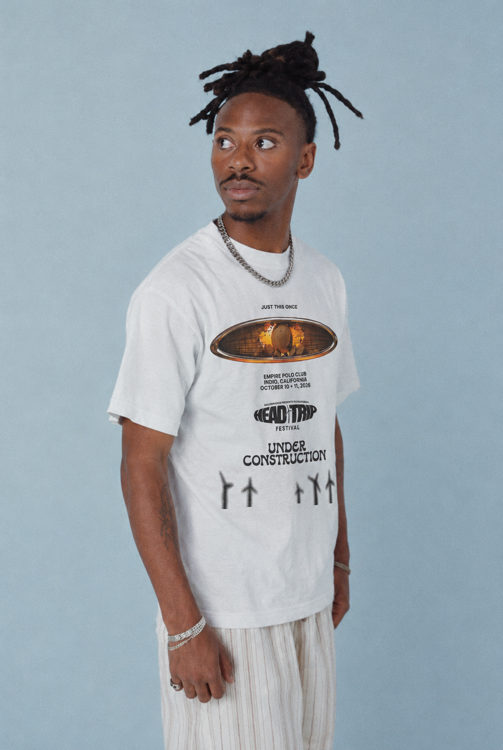 Three-quarter lifestyle view of UC Head Trip 2026 white tee