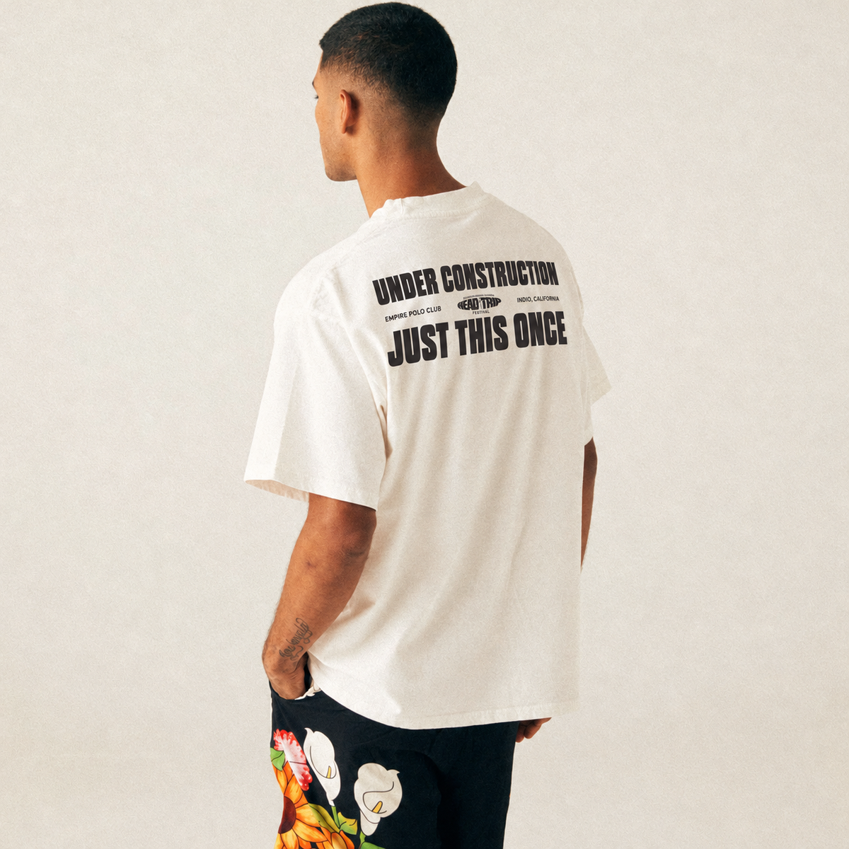 Back lifestyle view of UC Head Trip 2026 white tee