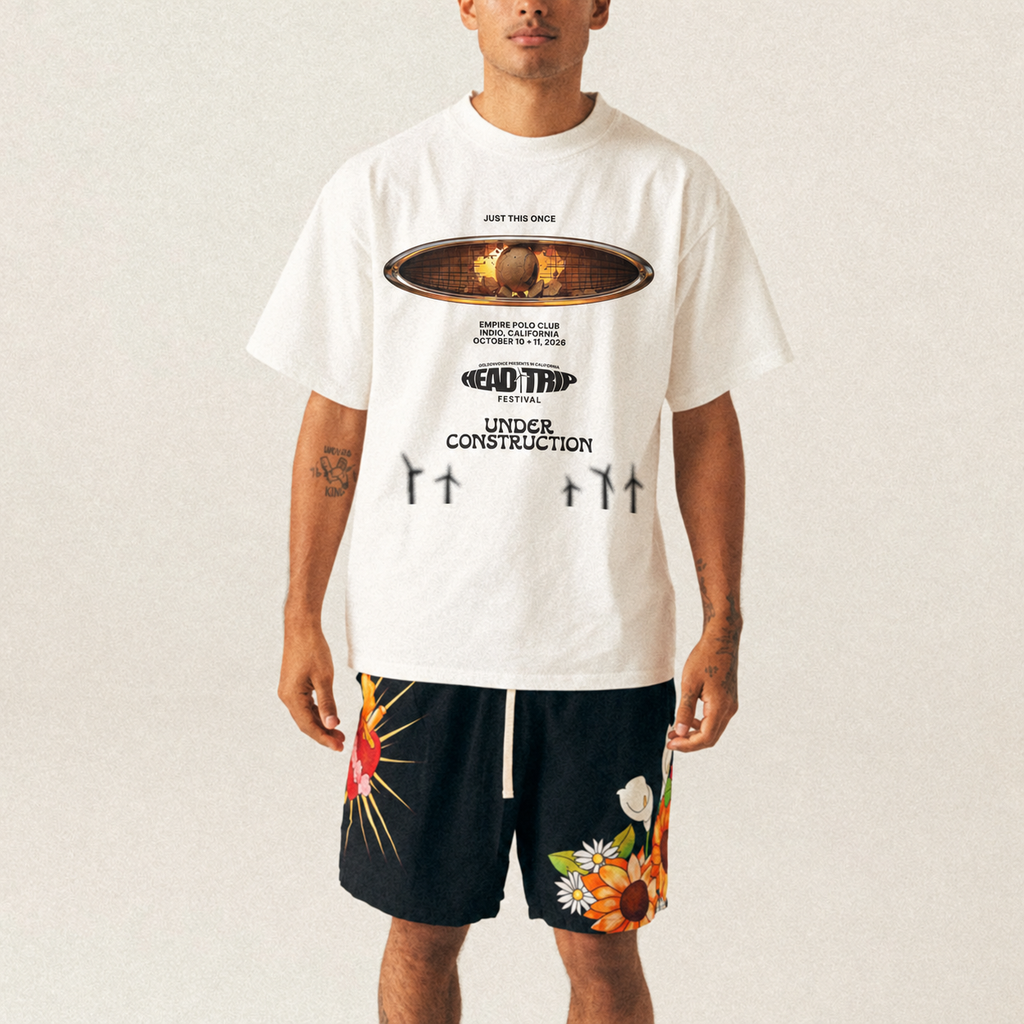 Model wearing UC Head Trip 2026 white tee