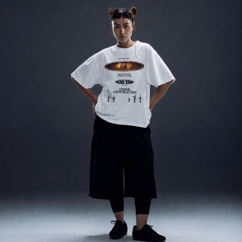 Studio lifestyle image of UC Head Trip 2026 white tee