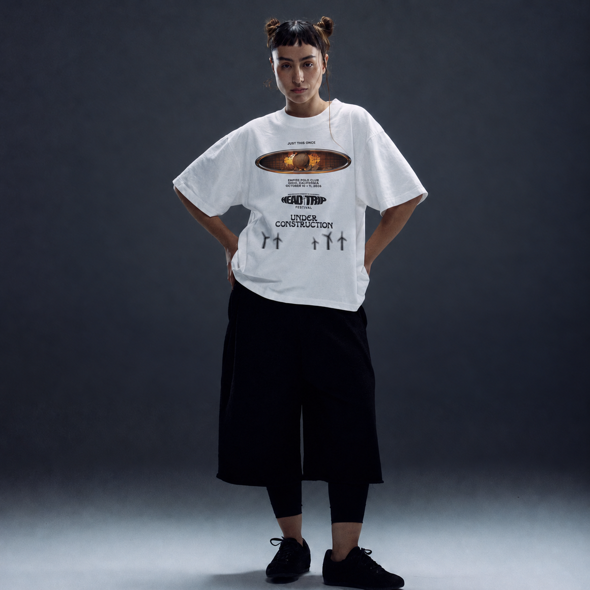 Studio lifestyle image of UC Head Trip 2026 white tee